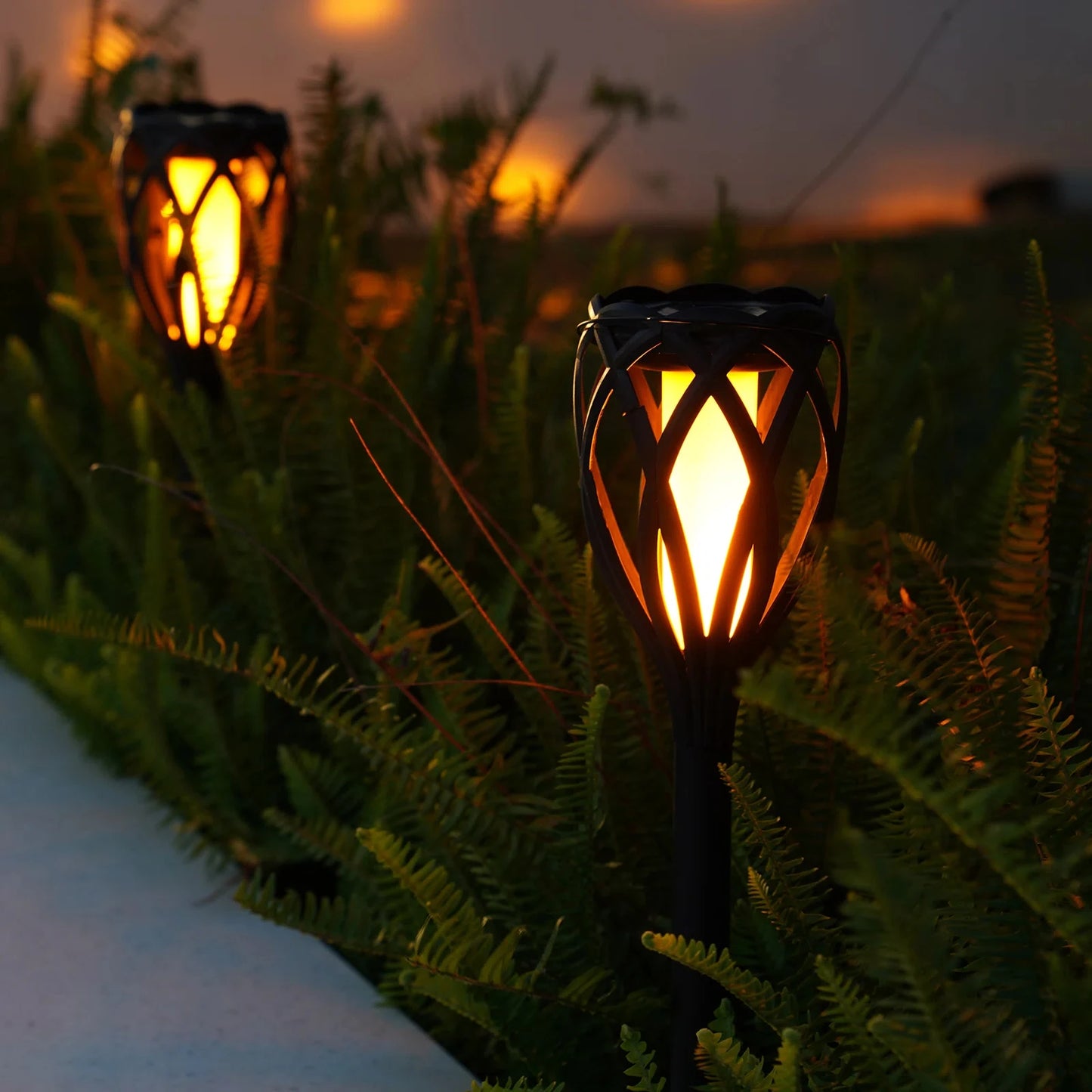 4-Piece Solar Pathway Torch Lights w/ Flickering Flame